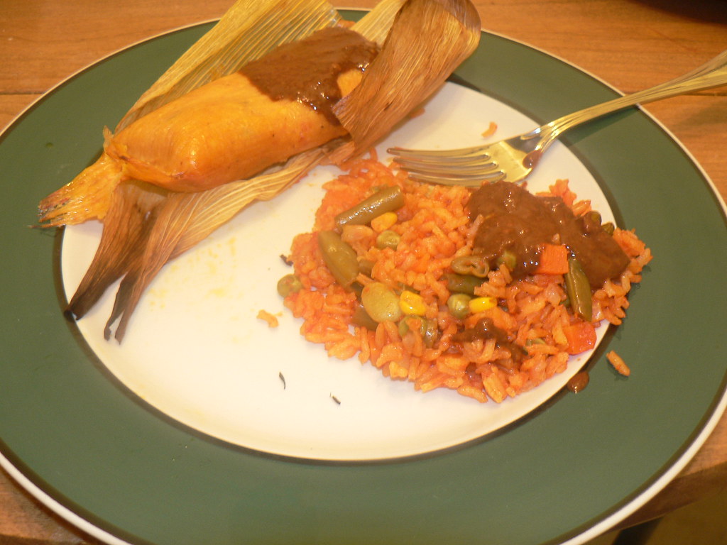 Mole rojo chicken tamale with red mole sauce
